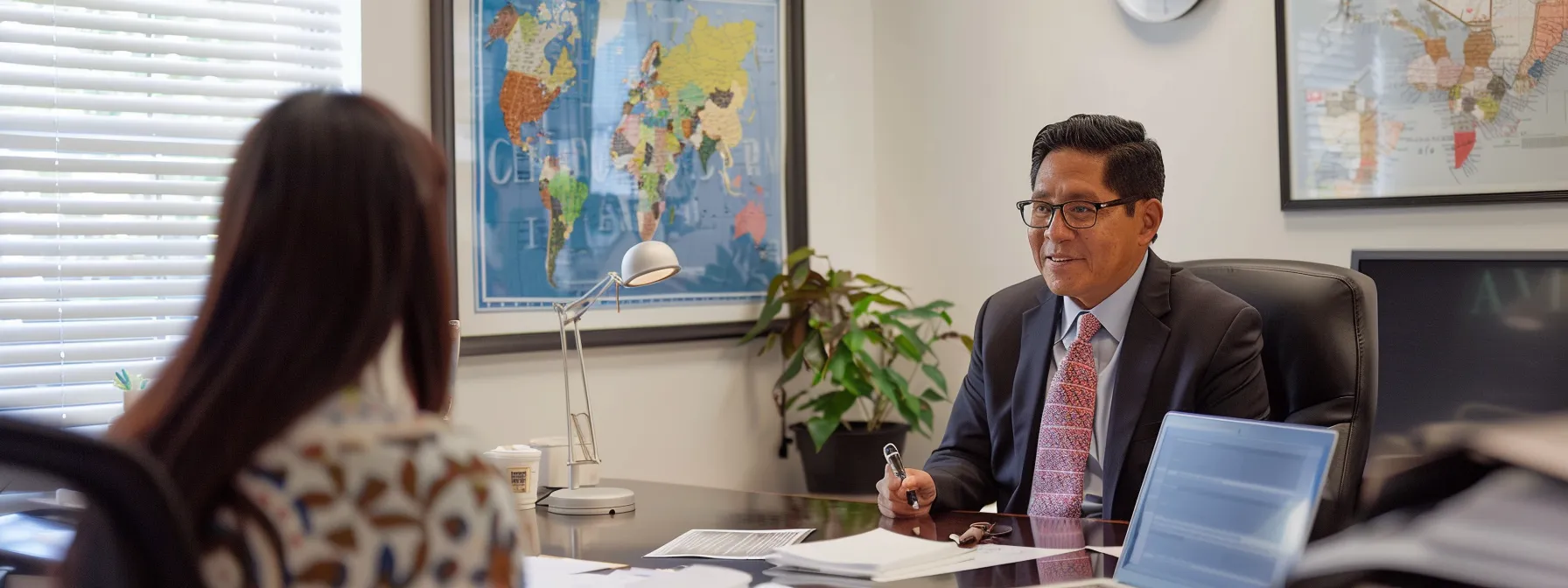a sleek, modern law office features a confident immigration attorney engaging in a focused consultation with a diverse client, surrounded by diplomas and regional maps, symbolizing local expertise and tailored legal guidance.