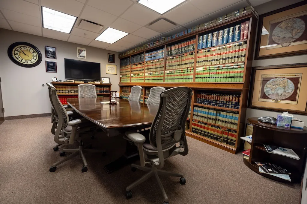 Local New Jersey attorney presenting strategies to a client, emphasizing advantages of local legal expertise